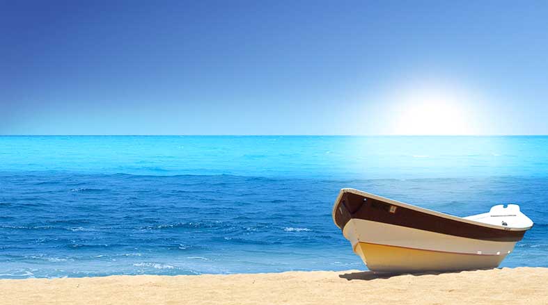 CANVAS OR PAPER PRINT OF THE BOAT ON BEACH