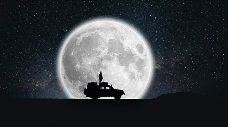 Canvas or Paper Print of Jeep in Moon